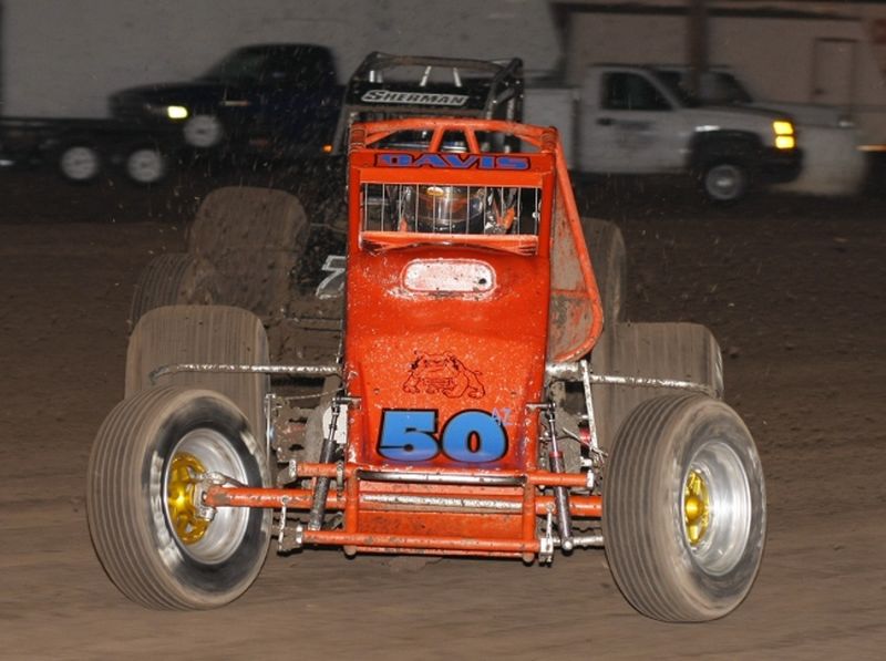 Charles Davis, Jr. (50) in front of Jeremy Sherman (77) in Saturday night's Discount Tire Co. ASCS Canyon Region event at Manzanita Speedway in Phoenix, AZ.