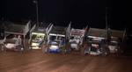 Sheldon Barksdale (20s), Justin Melton (11) and Robert Sellers (25) lead the three-wide salute prior to Saturday night's 25-lap American Bank of Oklahoma ASCS Sooner Region feature event at Lawton Speedway.