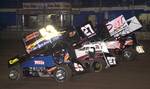 Jack Dover (53), Andy Shouse (27) and Jason Johnson (41) lead the three-wide salute prior to Friday night's 25-lap O'Reilly American Sprint Cars on Tour National series Red River Shootout feature event at Oklahoma City's State Fair Speedway.