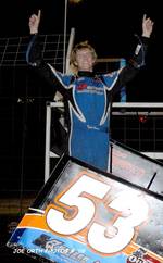 Jack Dover celebrates his victory in Friday night's American Sprint Car Series Midwest Region feature at U.S. 36 Raceway in Cameron, MO.