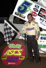 Gary Taylor snared his first career O'Reilly ASCoT National win by topping the opening round of the 16th Annual Toyota Tundra ASCS Sizzlin' Summer Speedweek at Sixty-Seven Texarkana Speedway on Friday night.