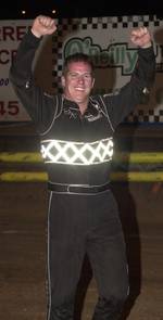 Jason Johnson celebrates his victory in Saturday night's 30-lap O'Reilly ASCoT feature event at State Fair Speedway's Spring Nationals in Oklahoma City.