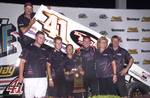 Current O'Reilly ASCoT National points leader Jason Johnson and The Shop Motorsports crew after winning Sunday night's 30-lap Brodix Tournament of Champions main event at Iowa's Knoxville Raceway.