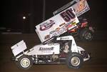 Zach Chappell (50z) and Jason Johnson (41) dice for runner-up honors in Saturday night's 16th Annual Toyota Tundra ASCS Sizzlin' Summer Speedweek main event at Little Rock's I-30 Speedway.